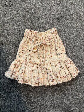 Misha & Puff cream with multicolored speckles skating pond skirt